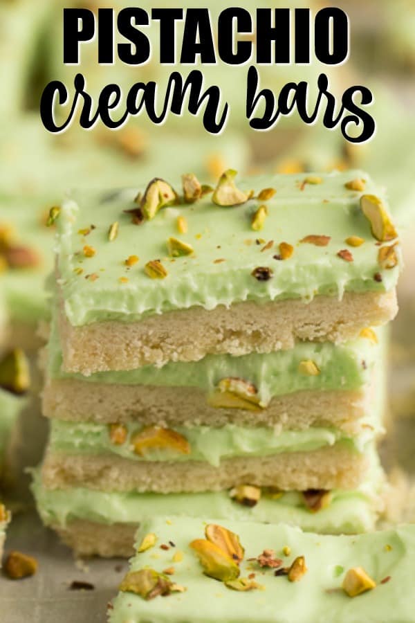 Pistachio Cream Bars - Made with a shortbread cookie base and filling that is a cross between a pudding and cheesecake. This vibrantly coloured dessert is a great make-ahead dish for entertaining. The crowd pleasing flavour of pistachio will be a winner!