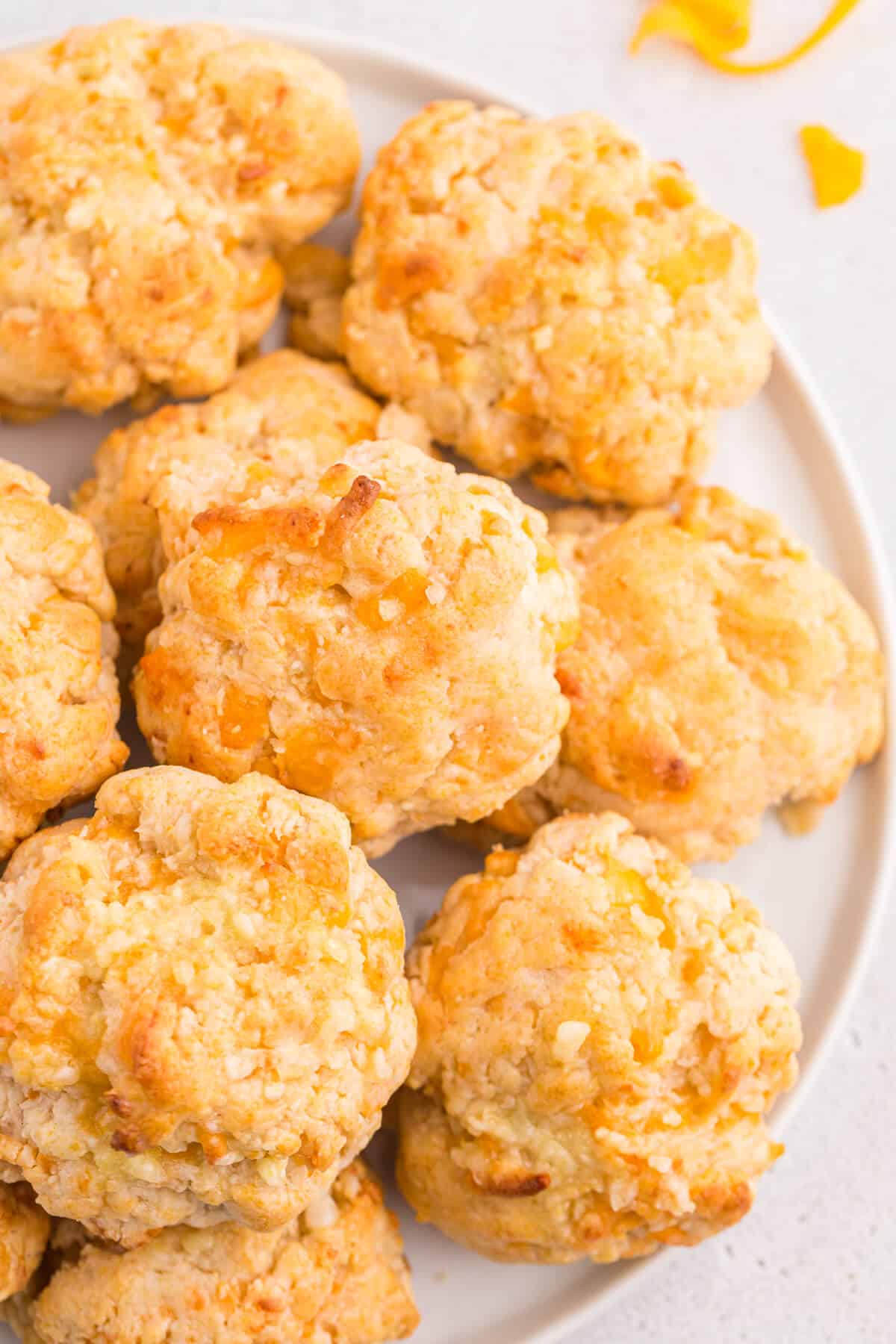 Cheesy garlic biscuits on a plate.