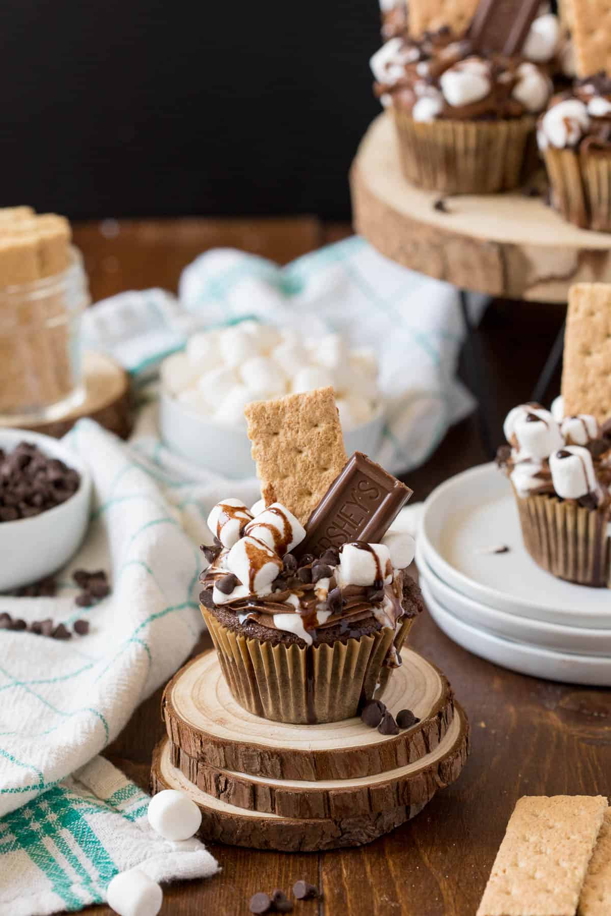 S'mores Cupcakes - This cupcake has everything you love about s’mores…..without the campfire! Sweet marshmallows, graham crackers and chocolate cake base make these eye catching cupcakes pop.