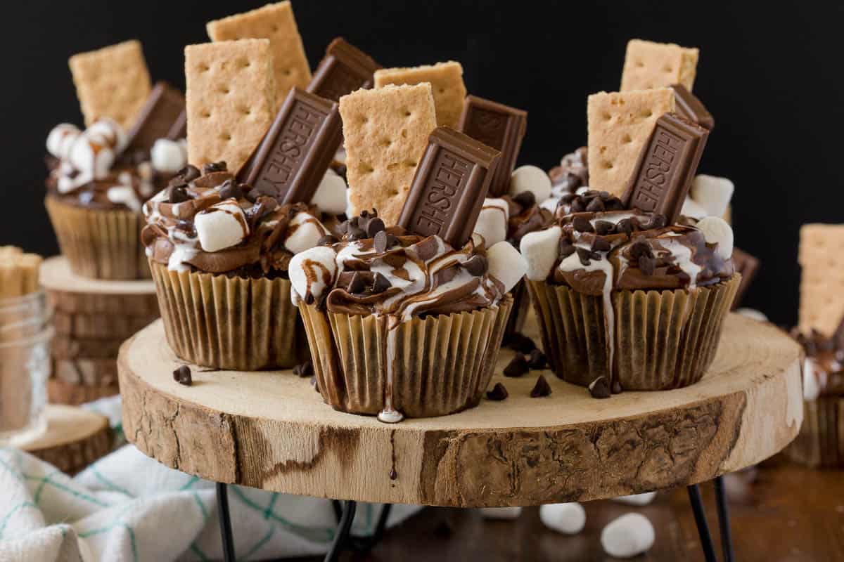 S'mores Cupcakes - This cupcake has everything you love about s’mores…..without the campfire! Sweet marshmallows, graham crackers and chocolate cake base make these eye catching cupcakes pop.