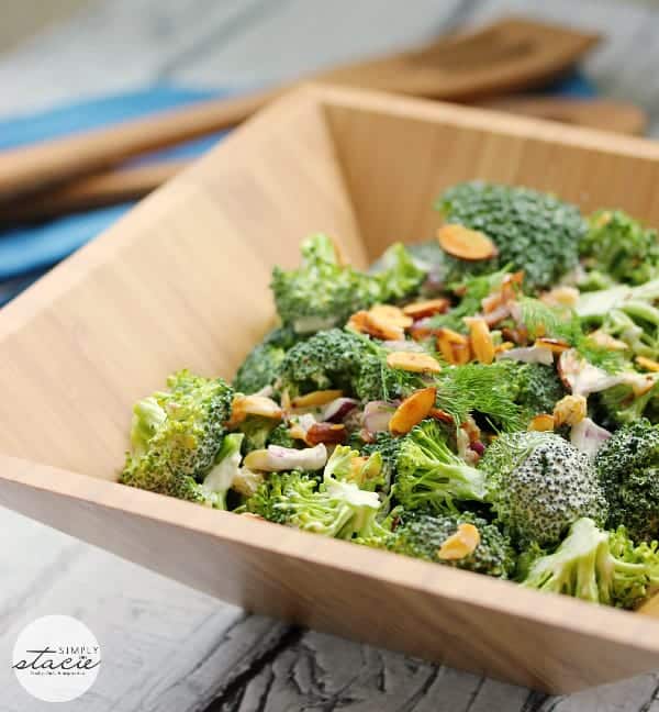 Broccoli Salad with Homemade Ranch Dressing - Perfect for your next barbecue with this dairy-free salad recipe! This easy vegetable side dish is super crunchy with loads of fresh broccoli, red onion, bacon, golden raisins and almonds and is covered in a creamy dairy-free homemade ranch dressing.