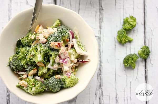 Broccoli Salad with Homemade Ranch Dressing - Perfect for your next barbecue with this dairy-free salad recipe! This easy vegetable side dish is super crunchy with loads of fresh broccoli, red onion, bacon, golden raisins and almonds and is covered in a creamy dairy-free homemade ranch dressing.