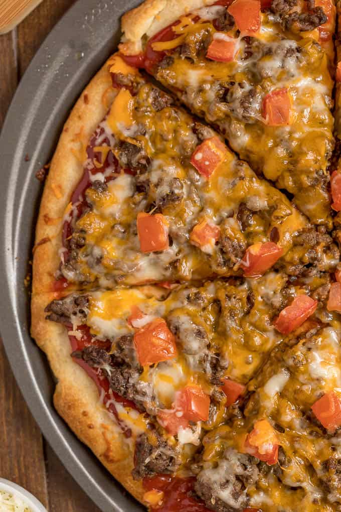 Cheeseburger Pizza - Two American favorites in one! Your kids will ask for this homemade pizza recipe again and again.
