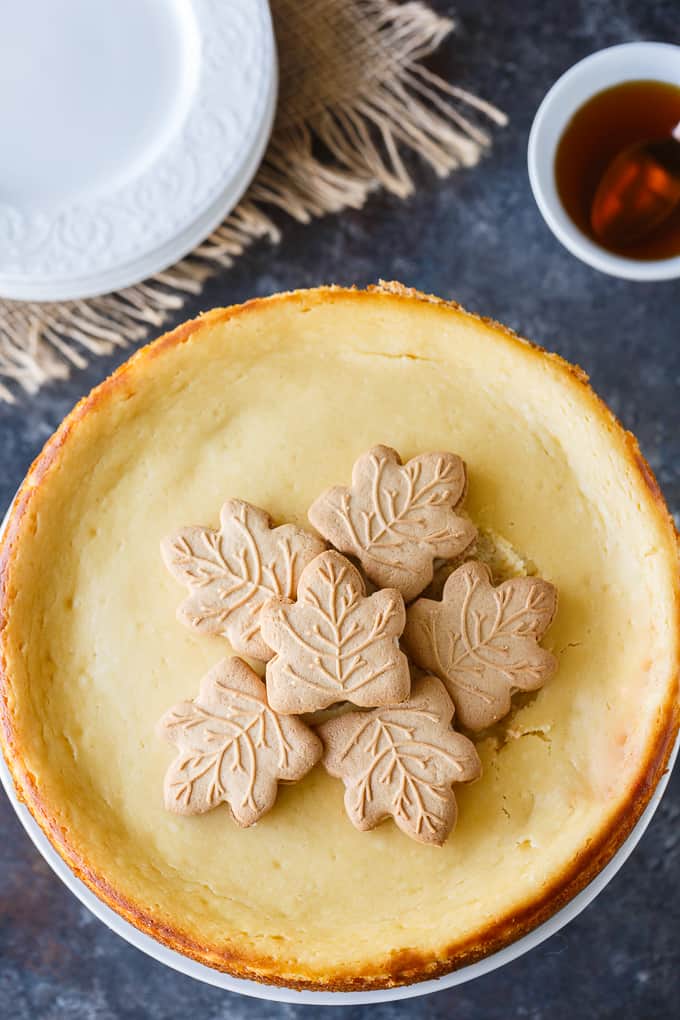 Maple Syrup Cheesecake - This might be the most Canadian cheesecake ever made! Using maple syrup to sweeten the cheesecake batter, and with maple syrup drizzled on top before serving, this smooth and creamy cheesecake is a great year round recipe - and perfect for a Canada Day celebration.