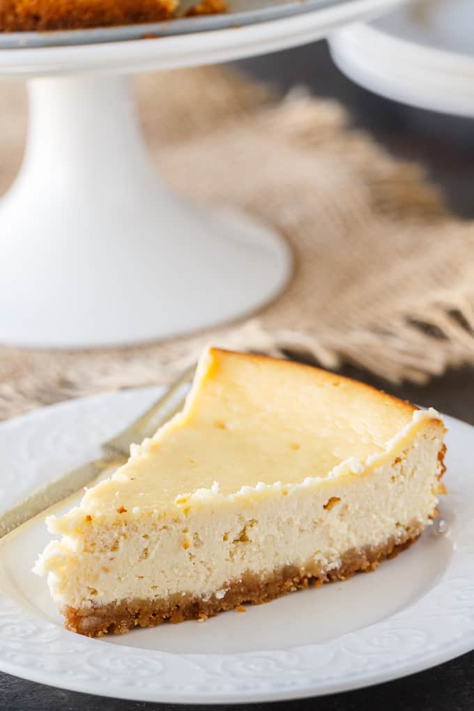 Maple Syrup Cheesecake - This might be the most Canadian cheesecake ever made! Using maple syrup to sweeten the cheesecake batter, and with maple syrup drizzled on top before serving, this smooth and creamy cheesecake is a great year round recipe - and perfect for a Canada Day celebration.