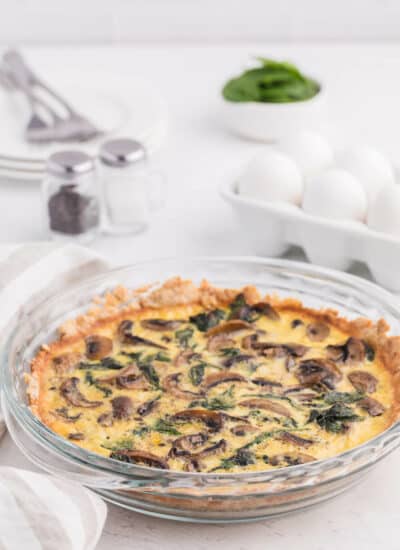 Spinach Mushroom Quiche- Fresh baby spinach, sliced mushrooms nestled in a creamy blend of eggs!