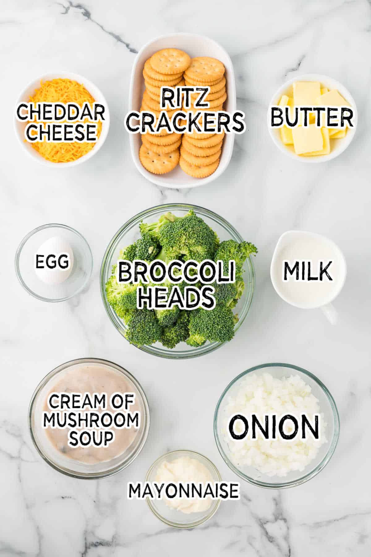 Ingredients on a white marble counter.