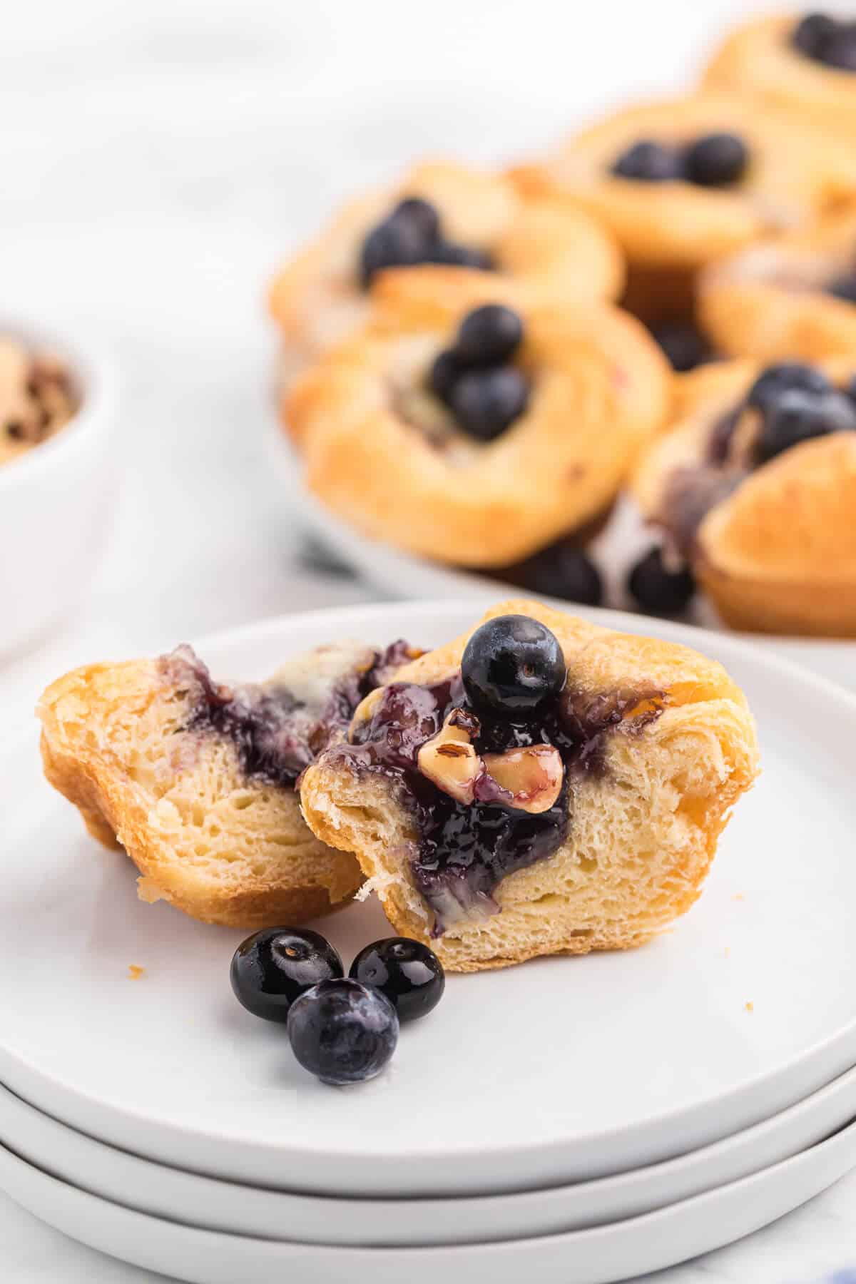 Blueberry Cheese Tarts - Sweet and savory combine in these delicate tarts! Serve as a sweet appetizer or a mini dessert.