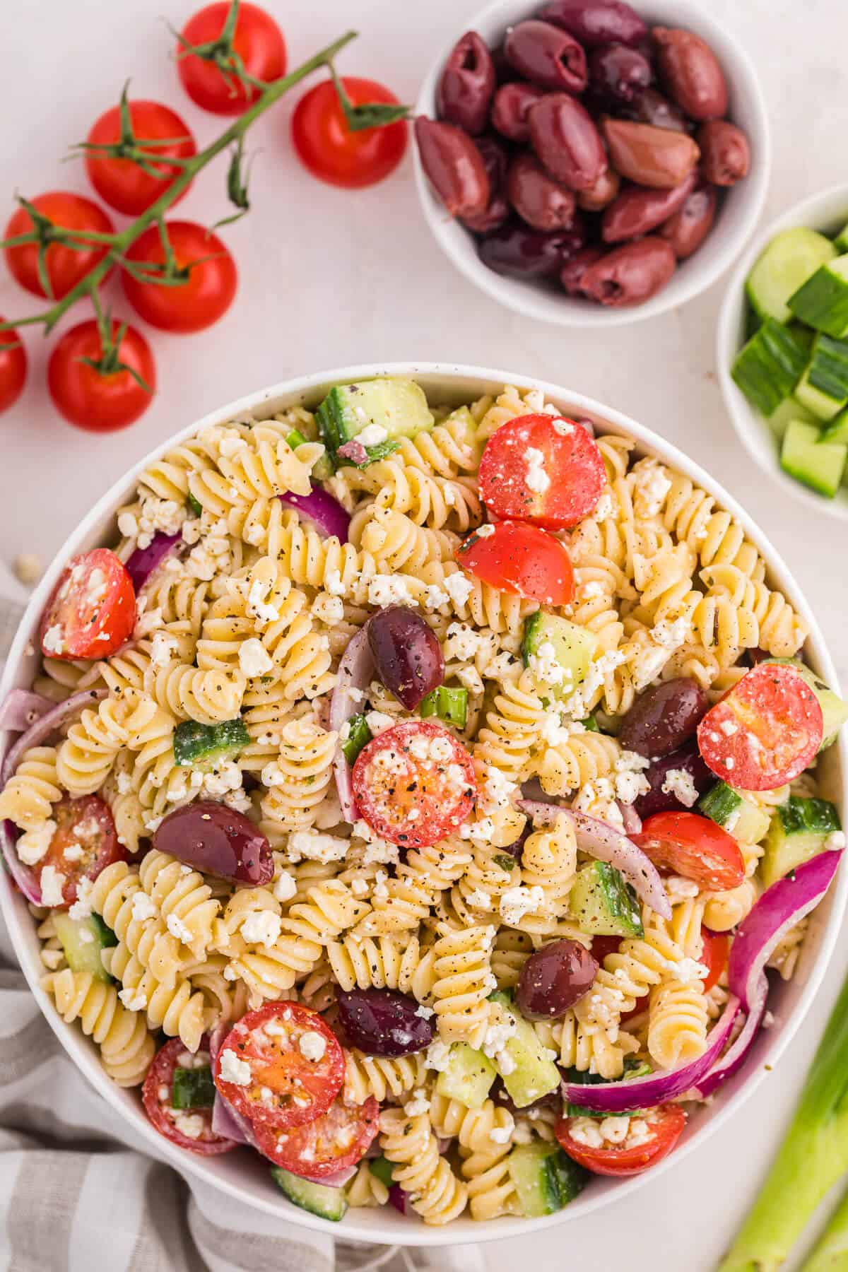 A bowl of greek pasta salad.