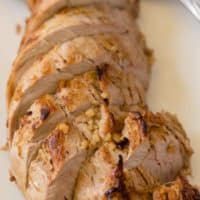 Honey Glazed Pork Tenderloin - Juicy & tender with a sweet honey garlic glaze with a hint of heat!