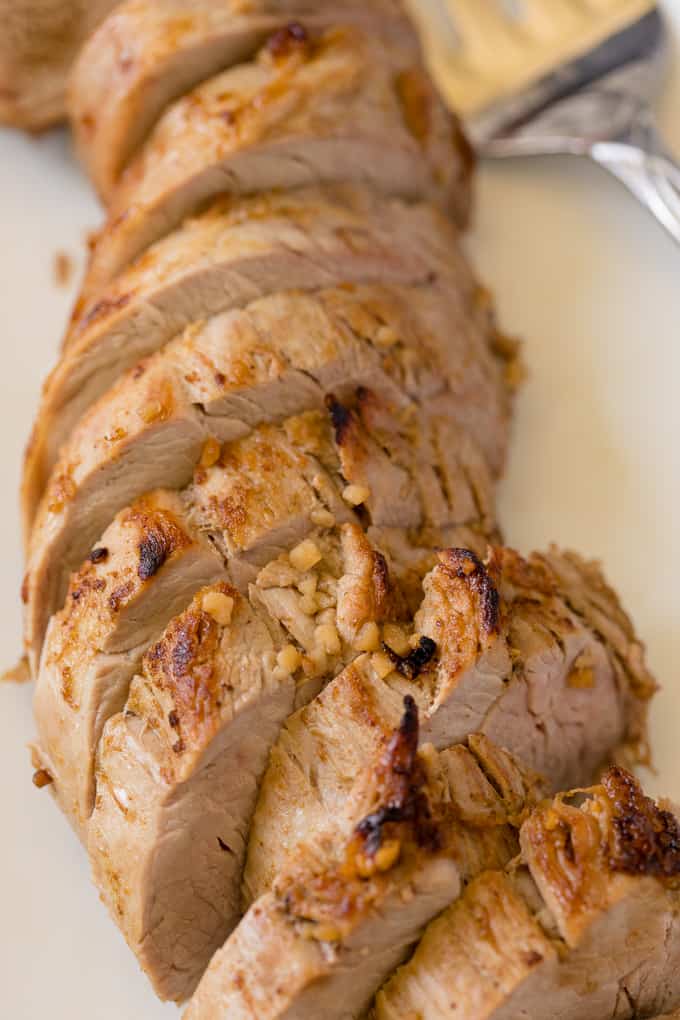Honey Glazed Pork Tenderloin - The perfect combination of spicy and sweet! It's seasoned beautifully with just 6 pantry staples.