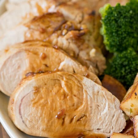 Honey Glazed Pork Tenderloin - Juicy & tender with a sweet honey garlic glaze with a hint of heat!