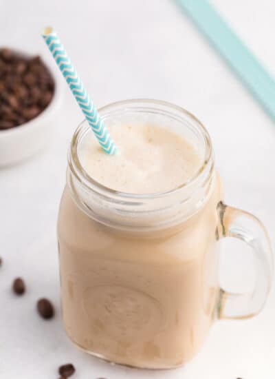 The Best Iced Coffee Ever - Cold, creamy sweet perfection! This easy summer drink can be whipped up in a minute. Made with a secret ingredient that brings it to the next level.