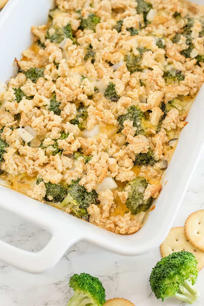Broccoli Casserole - Tender broccoli and creamy mushroom sauce, topped with cheese and a crispy cracker topping - this side dish is a classic for a reason! This is easy comfort food, that everyone in the family is sure to love.