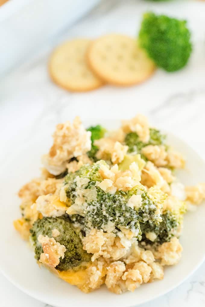 Broccoli Casserole - Tender broccoli and creamy mushroom sauce, topped with cheese and a crispy cracker topping - this side dish is a classic for a reason! This is easy comfort food, that everyone in the family is sure to love.