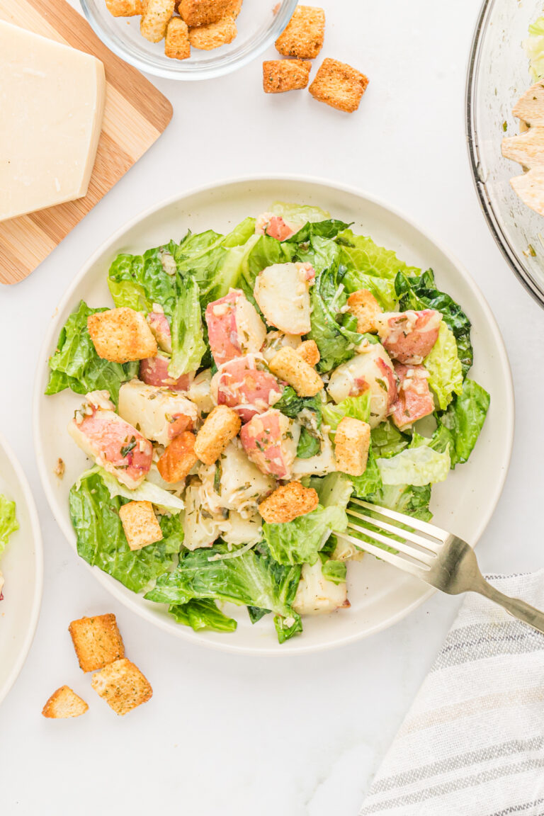 A plate of warm caesar potato salad.