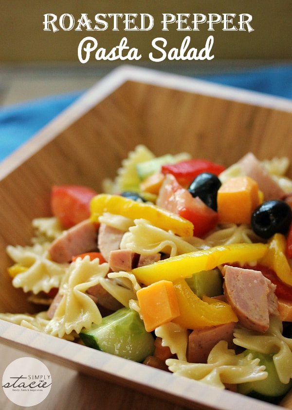 Roasted Pepper Pasta Salad - This pasta salad main dish is filled with ham, peppers, cucumbers, and topped with a mustard dressing. It's colorful, fresh and filling!