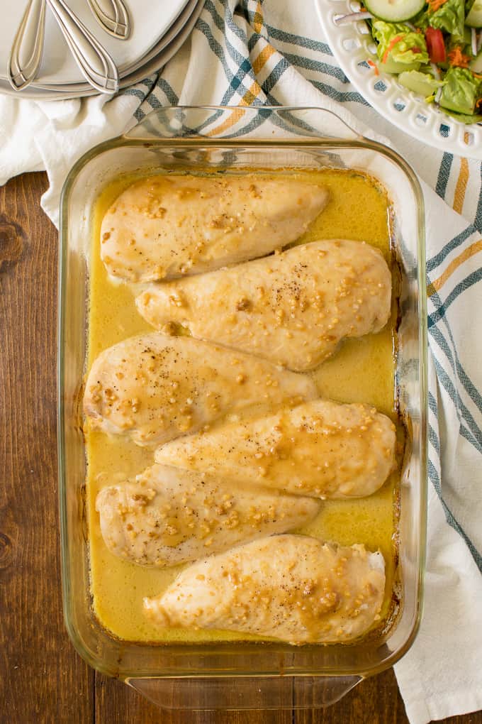 Honey Garlic Chicken in a clear baking pan.