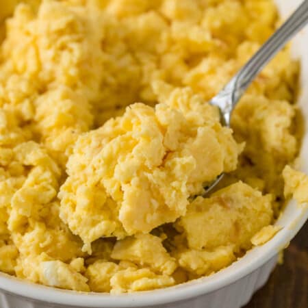 Oven Scrambled Eggs Recipe - These oven baked eggs are the perfect solution to cooking eggs for a crowd. No one likes cold eggs, especially the chef!