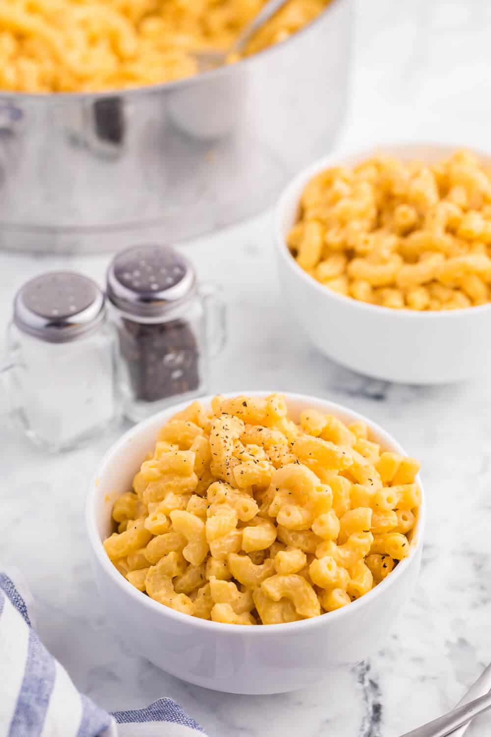 Stovetop Mac & Cheese - Who doesn't love mac and cheese? This quick, creamy and cheesy dish is so simple to make, you will never want mac and cheese from a box again!