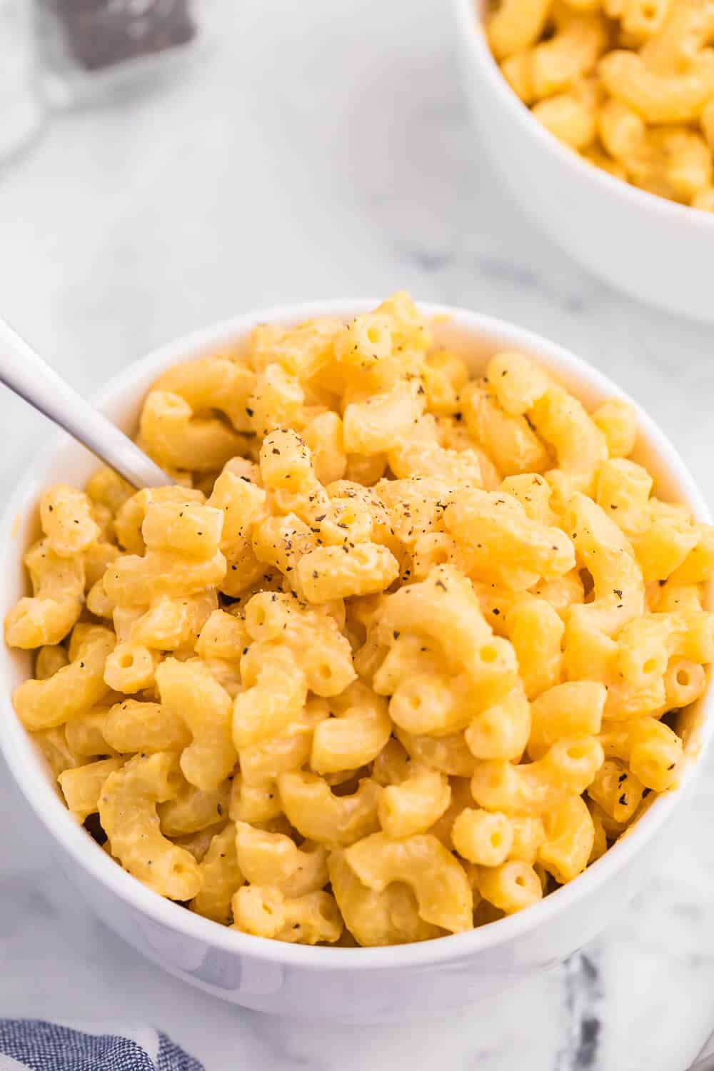 Stovetop Mac & Cheese - Who doesn't love mac and cheese? This quick, creamy and cheesy dish is so simple to make, you will never want mac and cheese from a box again!