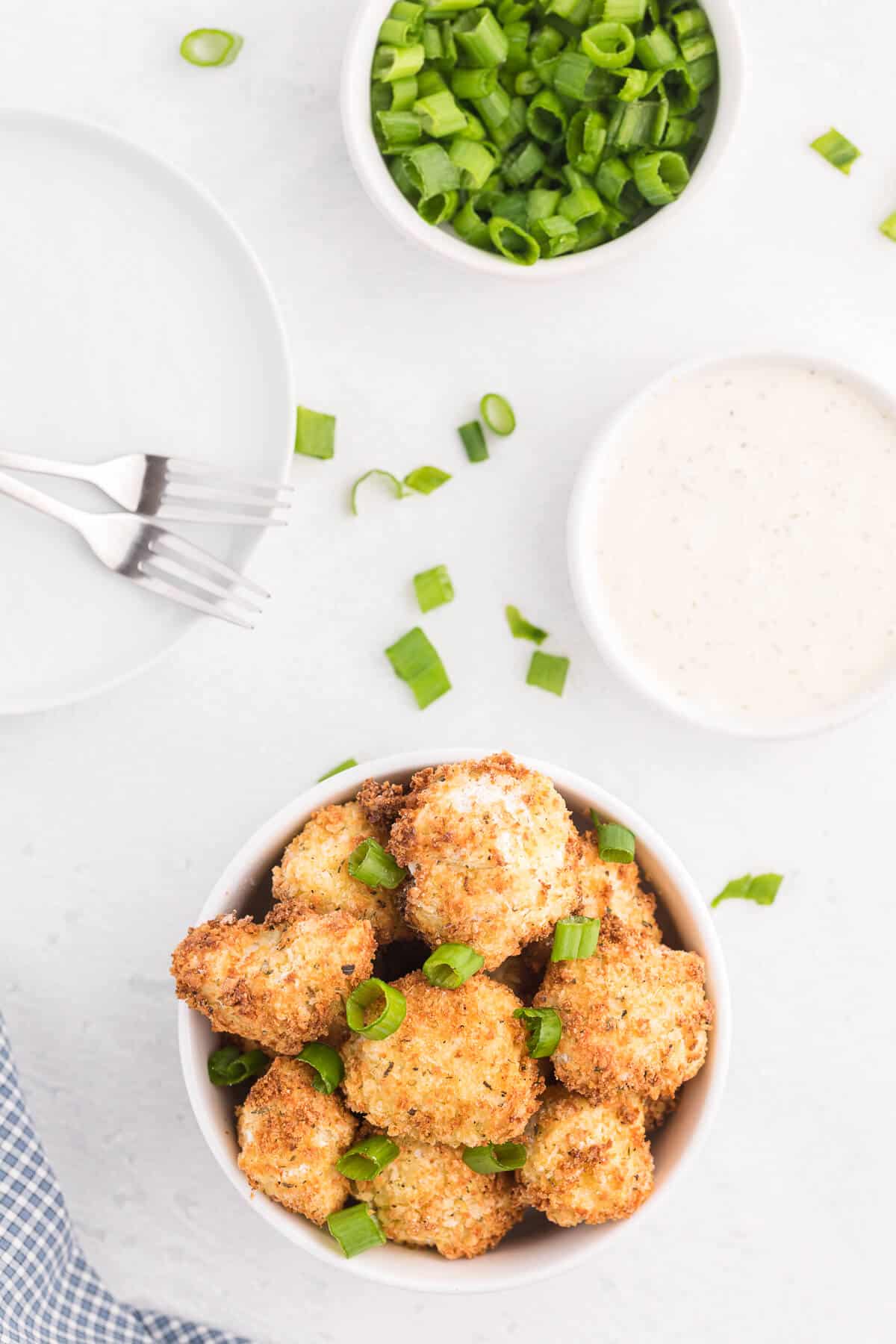 Air fryer cauliflower bites in a bowl.