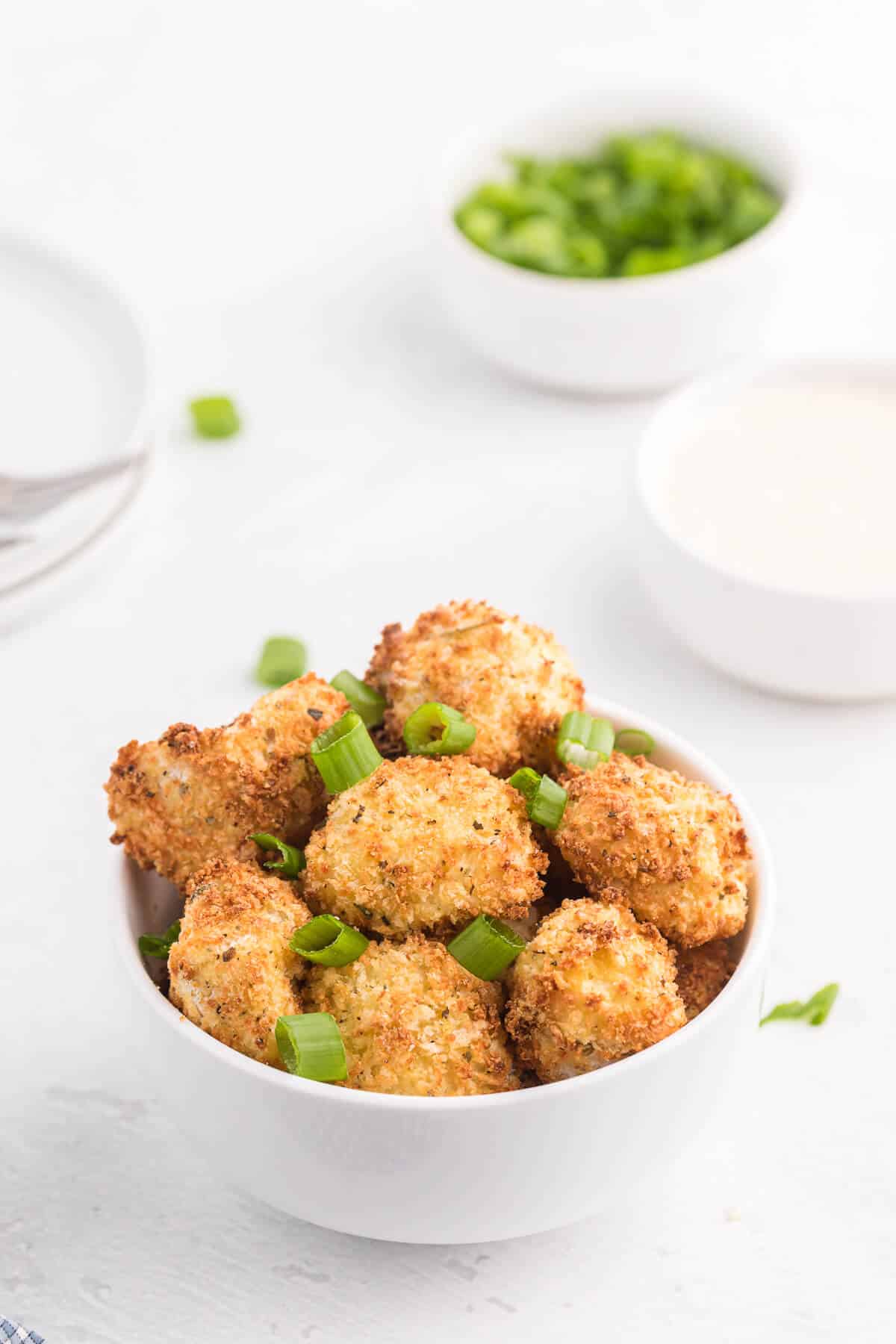 Air Fryer Cauliflower Bites - Get your kids to eat their veggies! Air fried cauliflower that's the perfect side dish or appetizer for dipping.