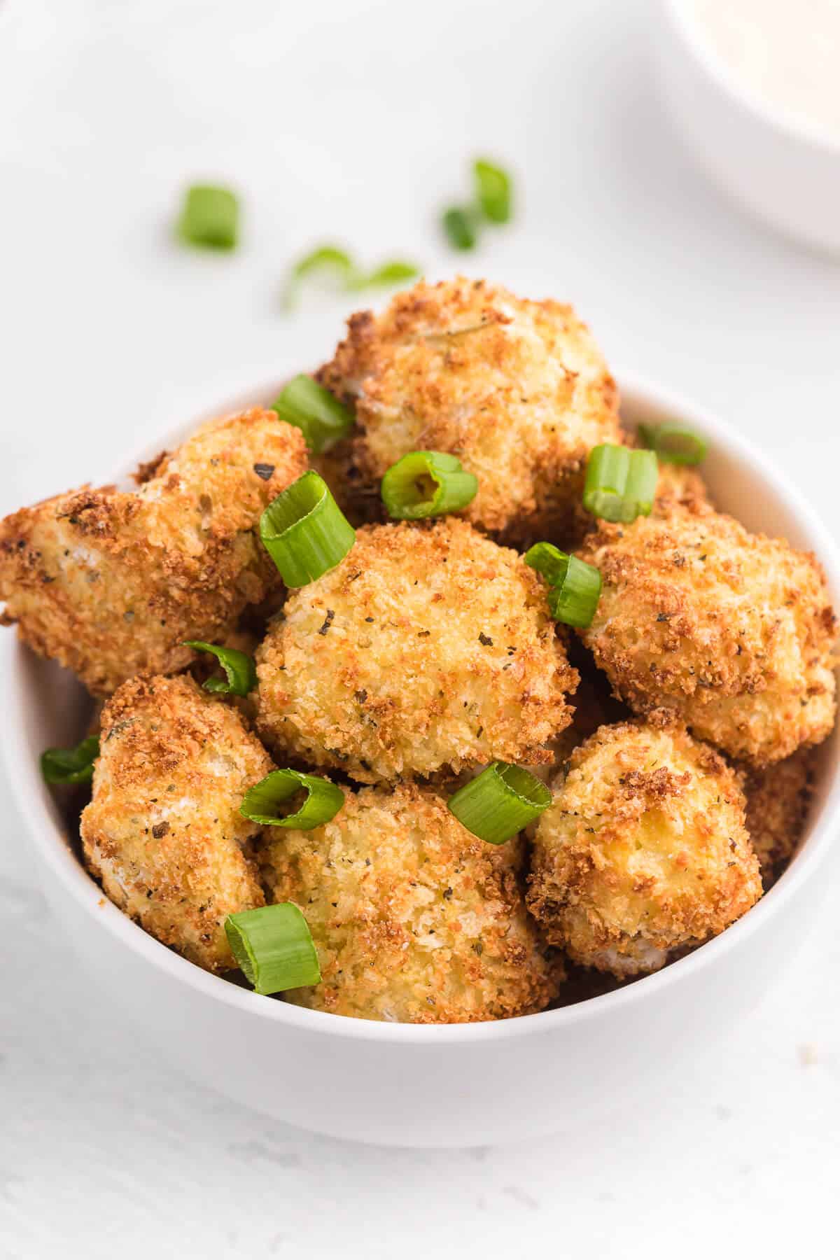 Air Fryer Cauliflower Bites - Get your kids to eat their veggies! Air fried cauliflower that's the perfect side dish or appetizer for dipping.