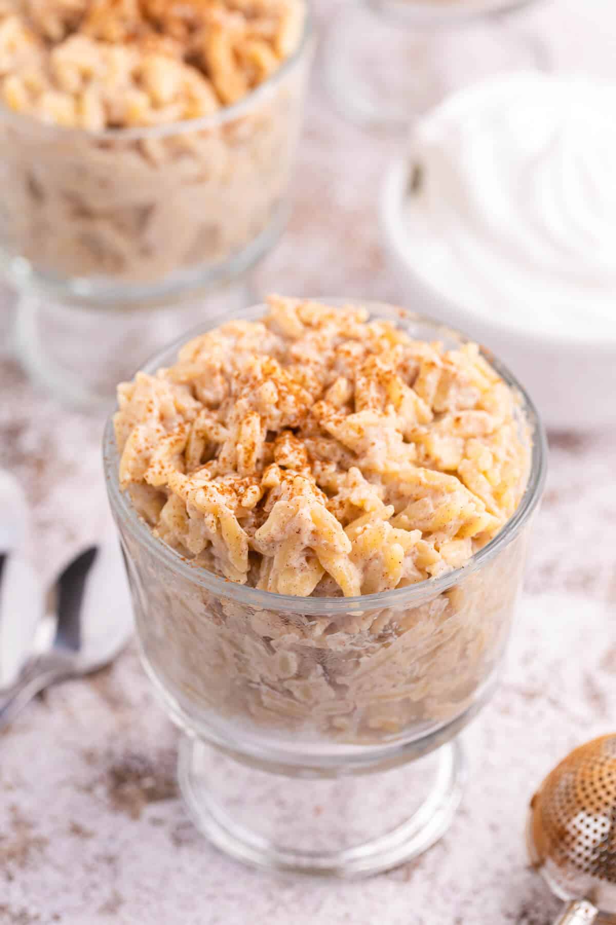 Orzo pudding in a parfait dish.