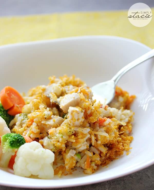 Creamy Chicken & Rice Casserole - Chicken, rice, veggies and a cheesy broccoli sauce are combined to make an easy one-dish meal, topped with a crunchy, buttery crust. This easy dinner idea is the definition of comfort food!