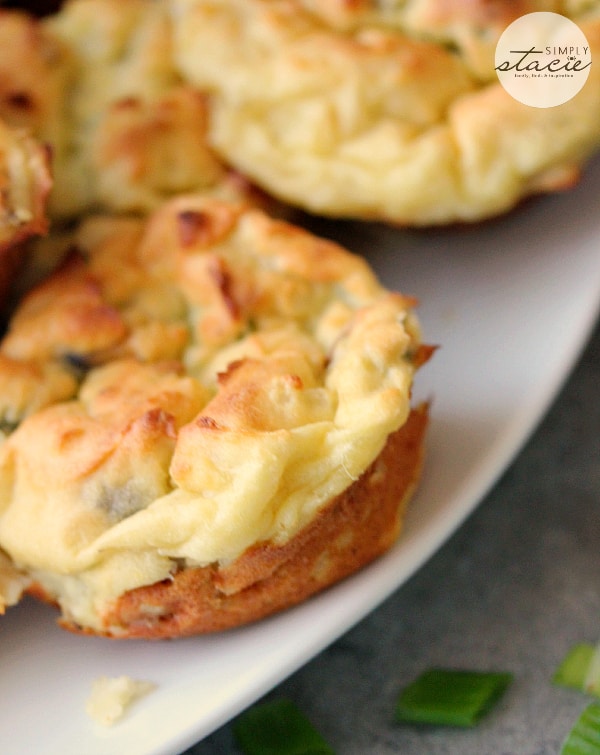 Muffin Tin Mashed Potatoes - Perfect for dinner parties! These loaded mashed potatoes are baked like savory cupcakes with mushrooms and green onions. The best way to use up leftover mashed potatoes!