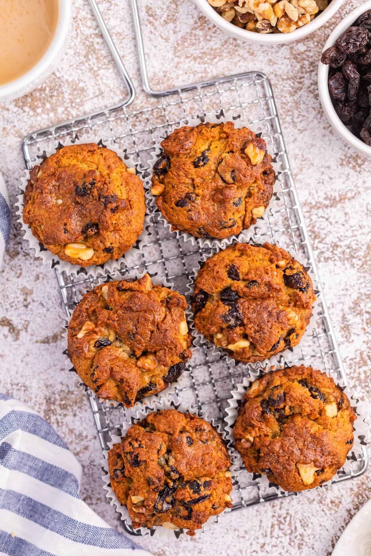 Butter tart muffins on a wire rack.