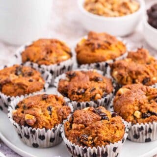 Butter tart muffins on a white plate.