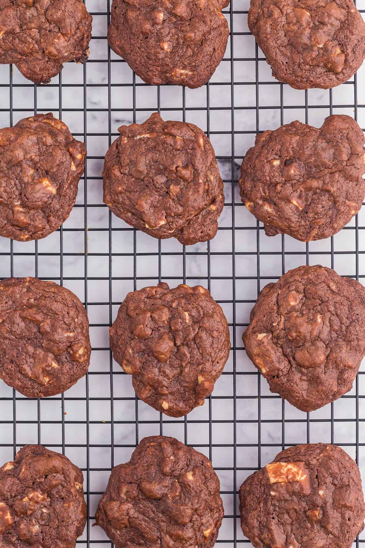 death by chocolate cookies overhead on a baking rack