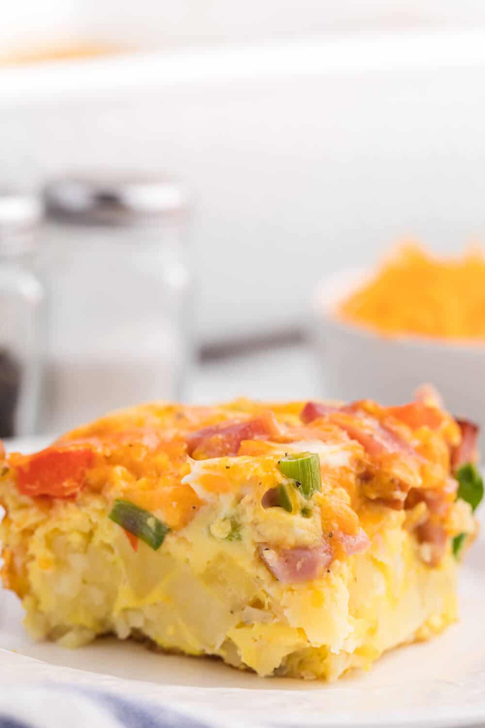 Hash Brown Quiche - Frozen hash browns, cheese, diced ham and green onions make a flavourful combination that are welcomed morning, noon and night.