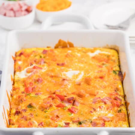 Hash Brown Quiche - Frozen hash browns, cheese, diced ham and green onions make a flavourful combination that are welcomed morning, noon and night.