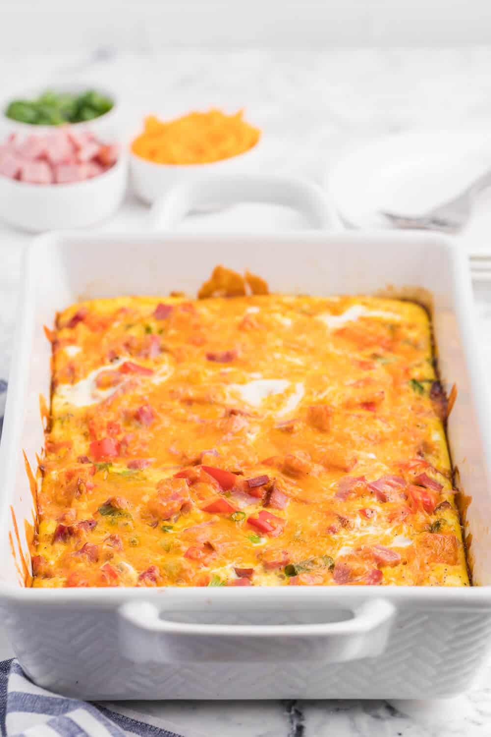 Hash Brown Quiche - Frozen hash browns, cheese, diced ham and green onions make a flavourful combination that are welcomed morning, noon and night.