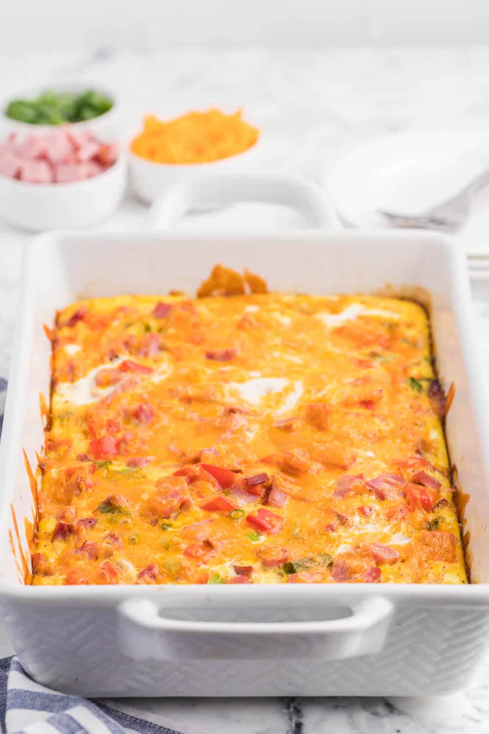 The recipe in a white casserole pan.
