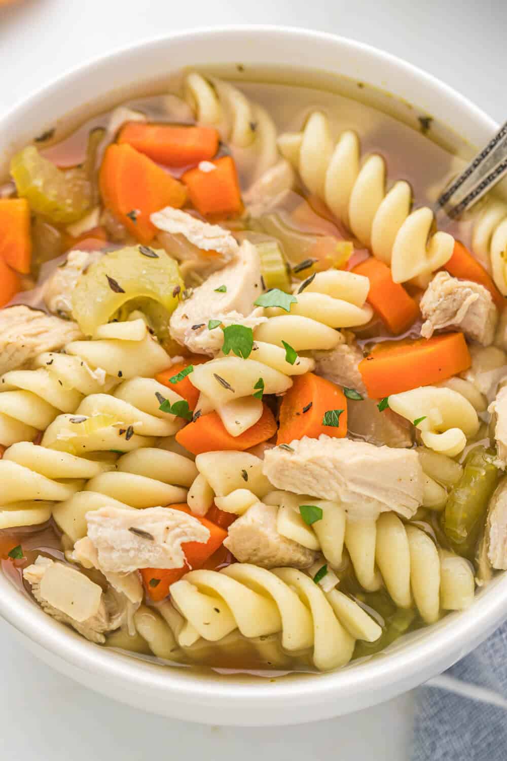 close up of a bowl of chicken noodle soup