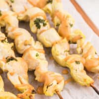 Chicken Satay with Peanut Sauce - This simple appetizer is a great crowd-pleaser! The homemade dipping sauce makes this easy recipe. Make them in the oven!