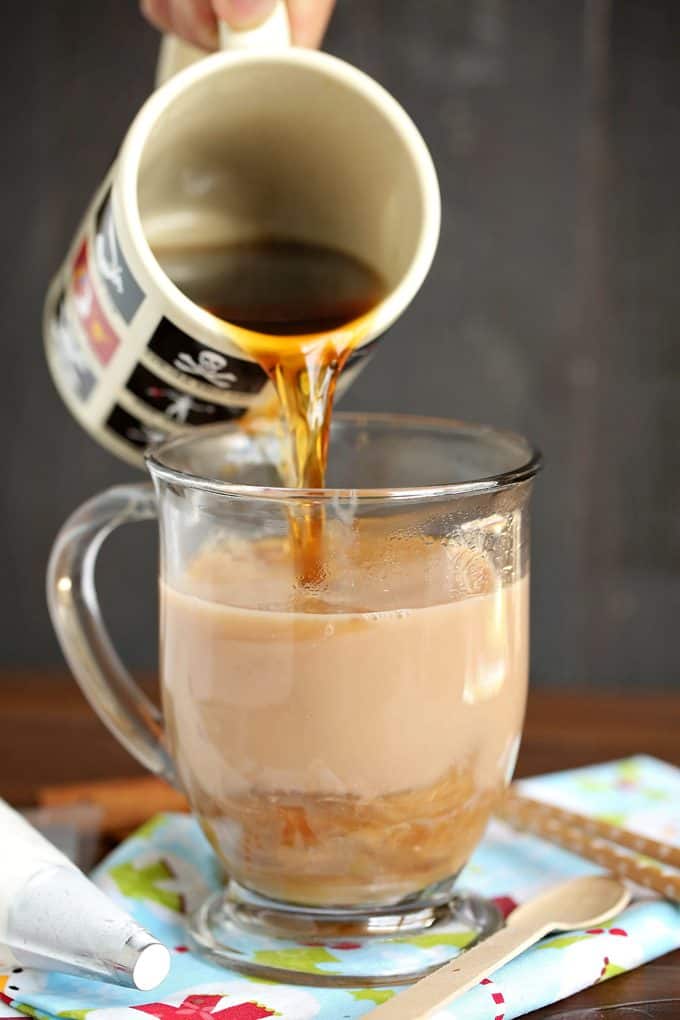 Gingerbread Latte - Quick and easy to make in your slow cooker, this flavour packed latte is full of holiday spice flavours, but can warm you up any time of year.
