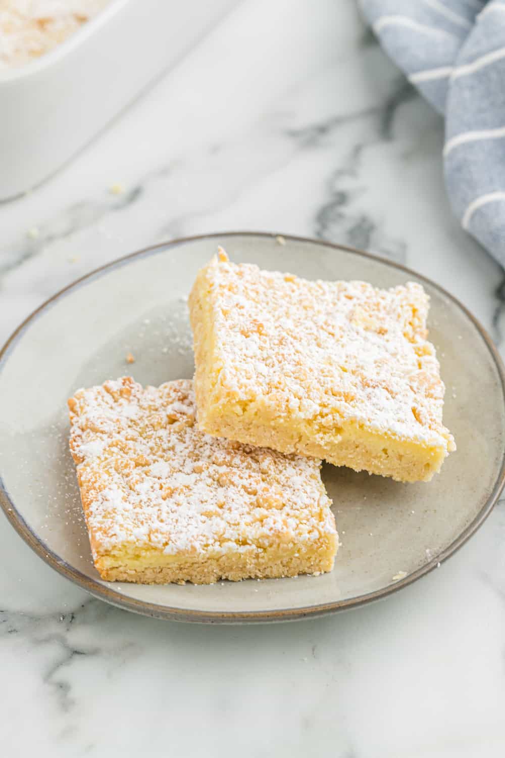 two pieces of french vanilla cream bars on a plate