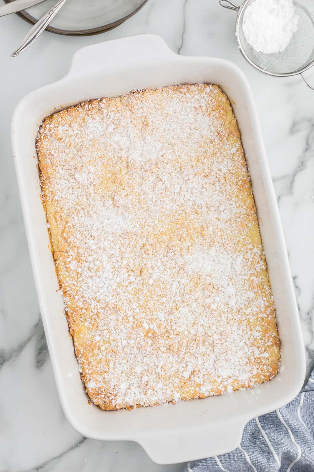 french vanilla cream bars in a white casserole pan