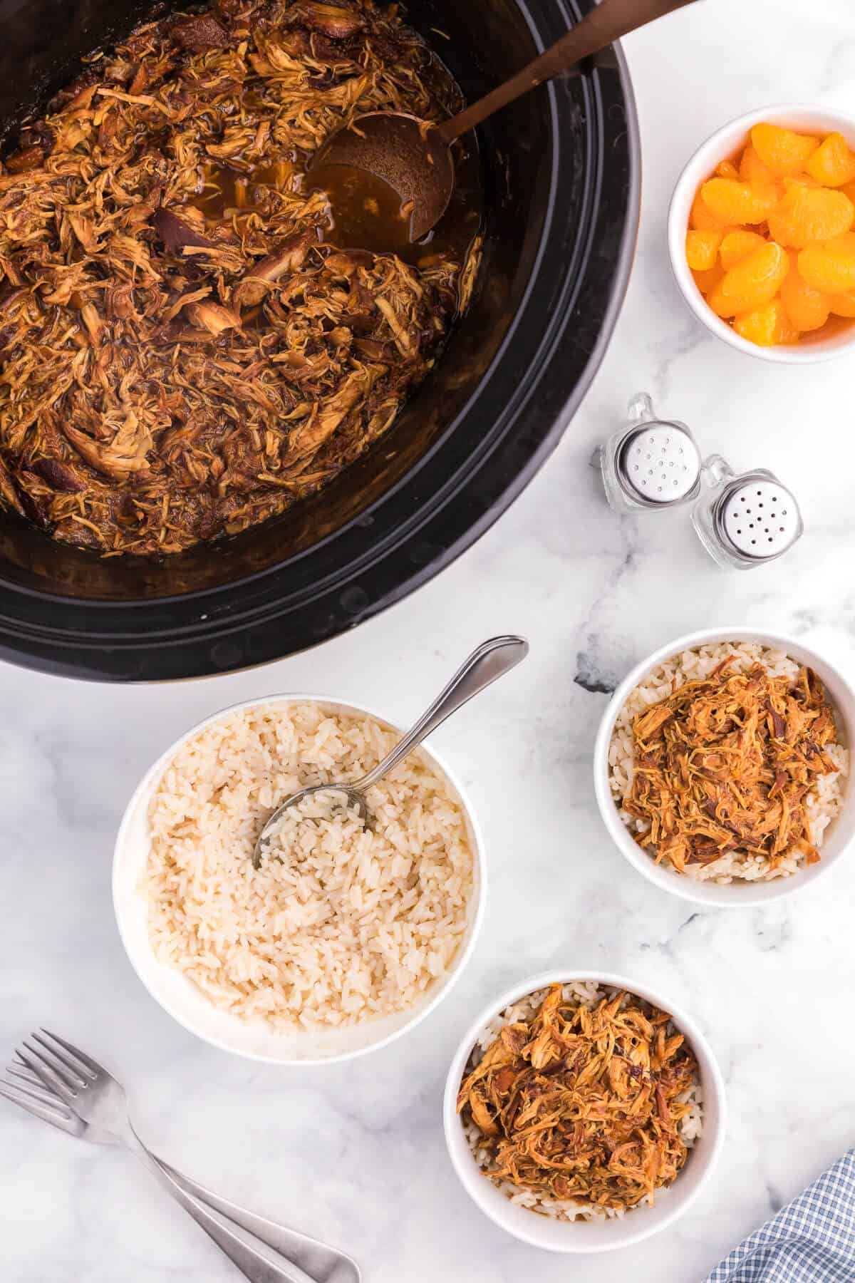 Slow Cooker Cranberry Orange Chicken - Add a tangy twist to your orange chicken! This Crockpot chicken recipe is perfect for the holiday season with cranberry sauce, ginger, and balsamic vinegar in this Asian-inspired main dish.