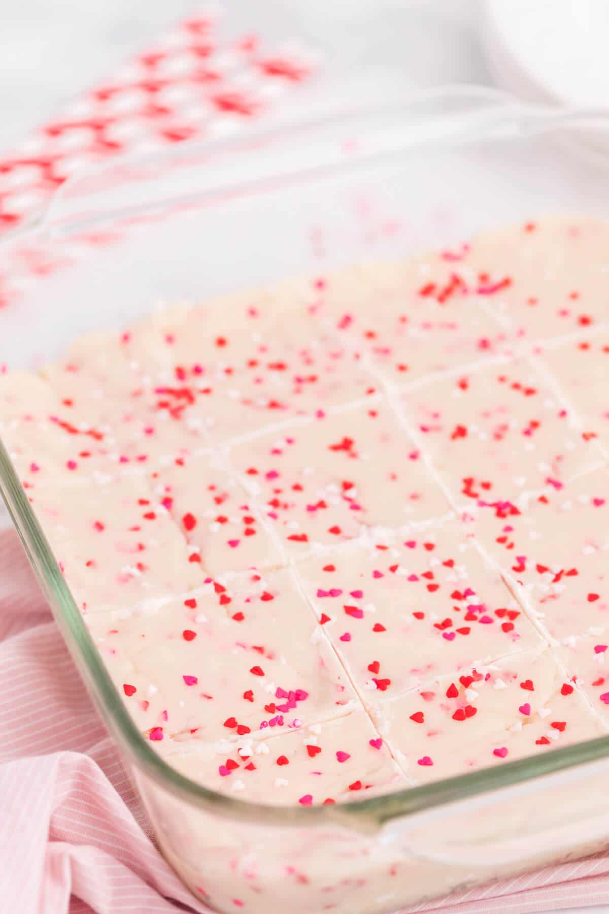 Valentine's Day Fudge - This vanilla "fudge" is made with a secret ingredient - a boxed white cake mix! This versatile sweet treat can be "changed up" by using different flavours of cake mix! It's guaranteed to satisfy your sweet tooth.