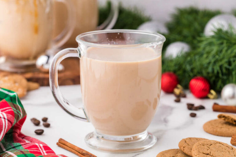 Gingerbread latte surrounded by Christmas decor.