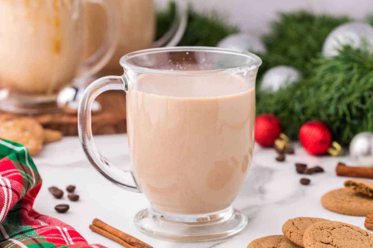 Gingerbread latte surrounded by Christmas decor.