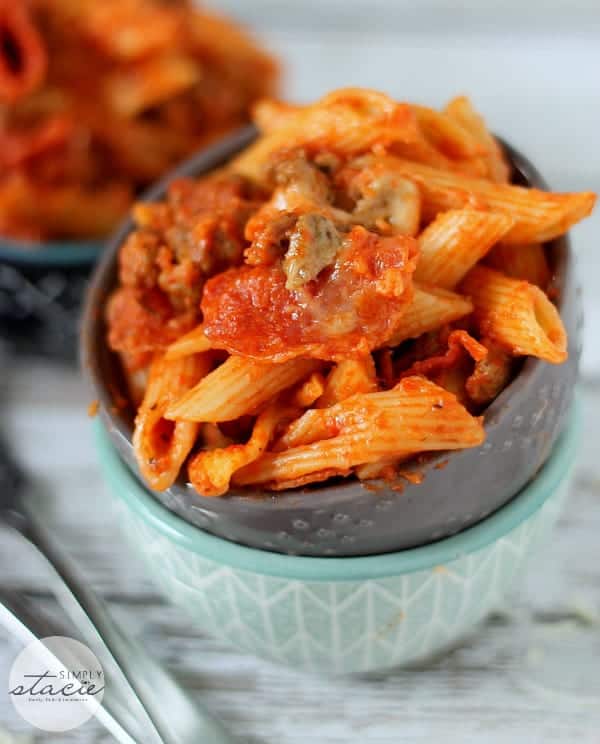 Slow Cooker Pepperoni Sausage Pizza Pasta is a quick and easy dinner that is kid-friendly. Loads of meat, sauce, cheese, and tender pasta. This pizza pasta is a must make for any pasta lover.