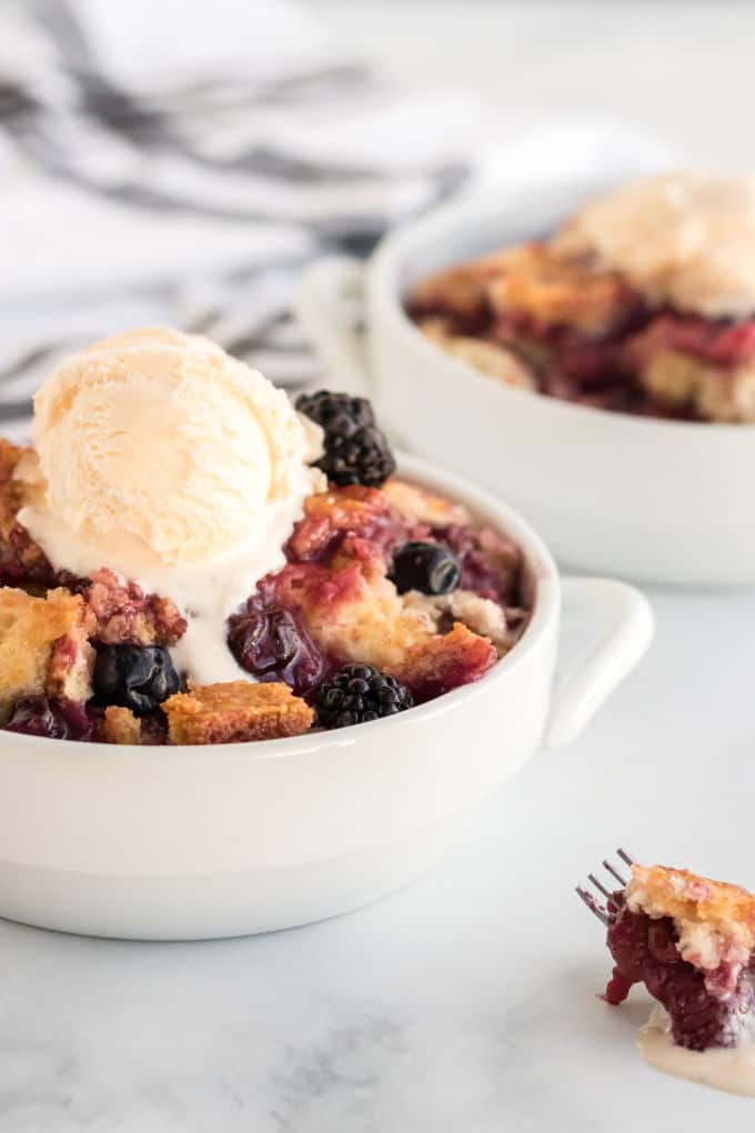 Cake Mix Cobbler - Only three ingredients in this simple recipe - pop, cake mix and frozen fruit!