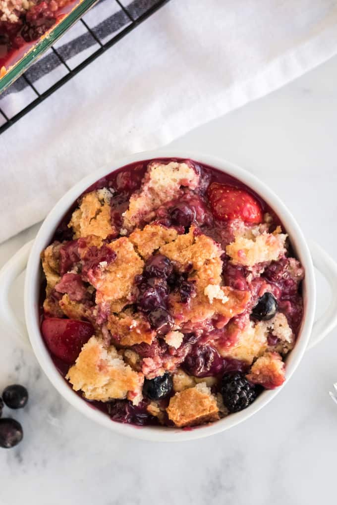 Cake Mix Cobbler - Only three ingredients in this simple recipe - pop, cake mix and frozen fruit!